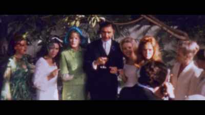 -[soft music playing]
-[indistinct chatter] - Lady Boss: The Jackie Collins Story