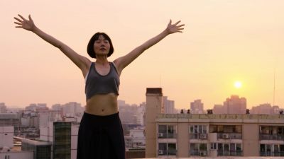 -[soft music plays]
-[woman singing] - Sense8