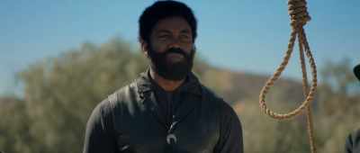 [soft suspenseful music] - Outlaw Johnny Black