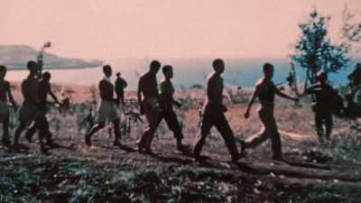 SOLDIERS ARE IN
IMPROVISED GROUPS, - The Pacific War in Color
