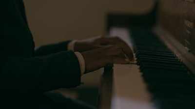 (sombre piano music) - The Porter