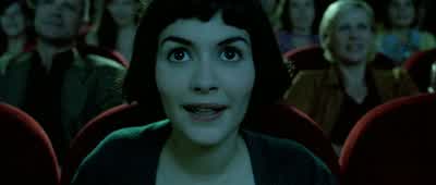 Some Friday evenings,Amélie goes to the cinema. I like turning aroundand looking at people's faces in the dark. - Amélie