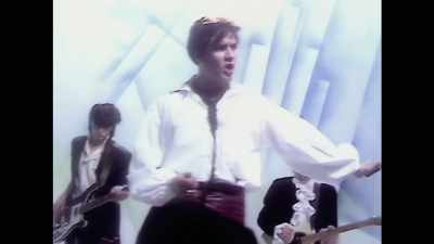 ♪ Some New Romantic
looking for the TV sound...  ♪ - Duran Duran: There's Something You Should Know