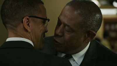 Somebody had told me
that the red-conked hustler - Godfather of Harlem