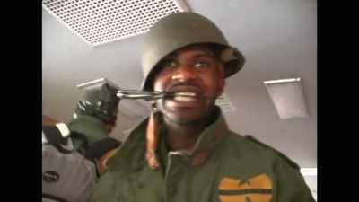 Someone started shooting.
I didn't see the Corporal. - Wu-Tang Clan: Of Mics and Men