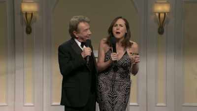 ‫♪♪
‫♪ something has changed within
‫her, she's ready to commit ♪ - SNL50: The Anniversary Special