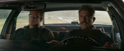 Somewhere rural,
where they're gonna exchange vehicles, - Dragged Across Concrete
