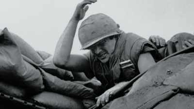 
(song continues, gunfire, - The Vietnam War