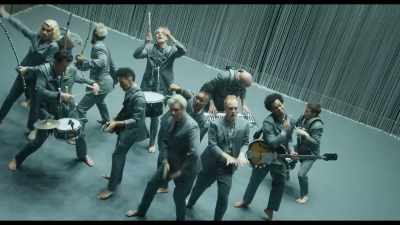 - (SONG RESUMES)
- ♪ We dance like this - David Byrne's American Utopia