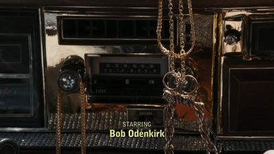 [SPANISH HIP-HOP MUSIC
PLAYING OVER SPEAKERS] - Better Call Saul