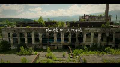 [Spanish song playing] - La Madre