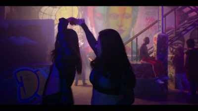 [Spanish song playing] - La Madre