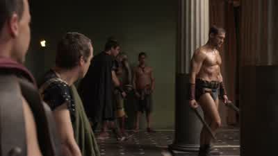 Spartacus wields practice swords. - Spartacus