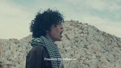 [Speaking Arabic] - The Little Drummer Girl