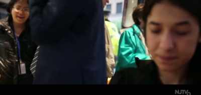 -[ Speaking native language ] - On Her Shoulders