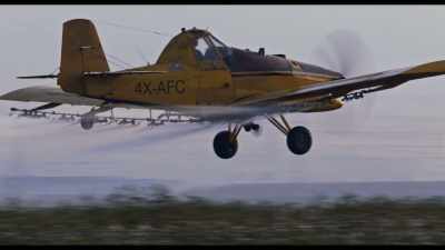 Spraying the soil
with toxic chemicals - Kiss the Ground