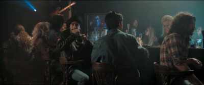 [Springsteen sings on TV] - Blinded by the Light