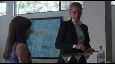 Squeeze it, out side out.
Get a nice little mist. - A Simple Favor