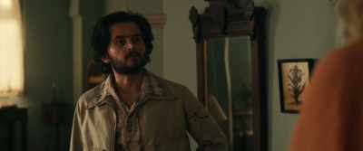 [STAMMERS] I should've told him. I'm... I'm sorry, Lisa. - Shantaram