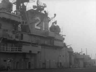 Stand
by to land helicopter. - Submarine Command