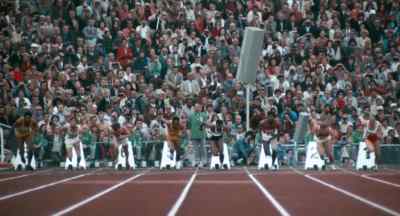 - (starter pistol fires)
- (spectators cheering, shouting) - Visions of Eight