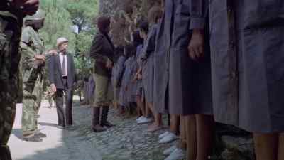 Step out of line and you'll
be severely punished. - Women in Cellblock 9