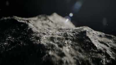 Still only as big
as a grain of sand, - One Strange Rock