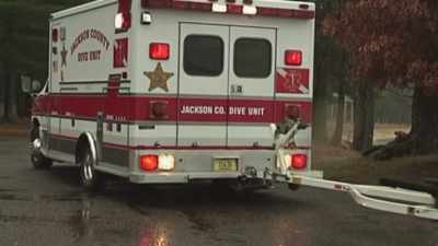 Stokes: WHILE NO LONGER
OUT IN THE WOODS, - Hometown Homicide