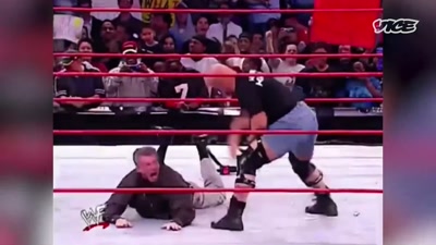 Stone Cold's laying
Mr. McMahon's bare ass out - The Nine Lives of Vince McMahon