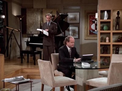 Stop giggling. It's distracting. - Frasier