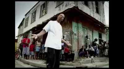 Su corte de pelo
y el diente de oro, - The Honorable Shyne