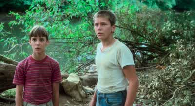 "Suck my fat one?" Whoever told you you had a fat one, Lachance? - Stand by Me