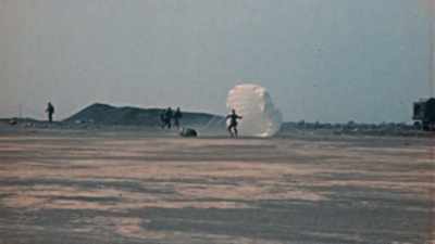 Supplies drop down that
will help turn this arid rock - The Pacific War in Color