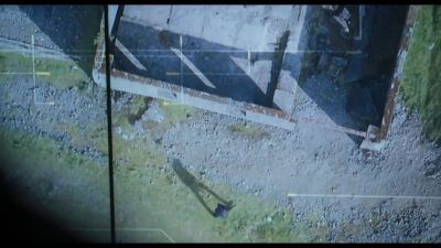 SURVEILLANCE OFFICER: 'Suspect in building. - Six Four
