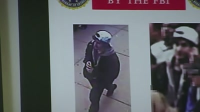 Suspect 2 set down a backpack - FBI TRUE