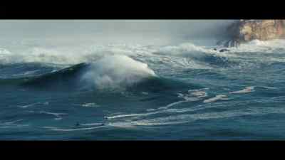 [suspenseful percussive music] - 100 Foot Wave