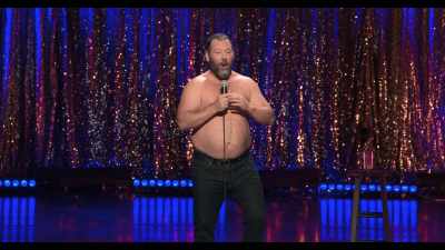 Sweater on. Bifocals. Reading a magazine. - Bert Kreischer: Razzle Dazzle
