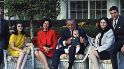 [Sweig] Lynda and Luci's
men going off to war, - First Ladies