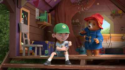 Switch them on like this,
then squeeze the big button to talk. - The Adventures of Paddington