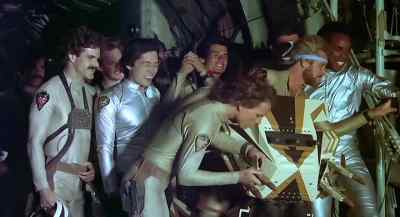 Take her down to 100 feet off the deck! - Megaforce