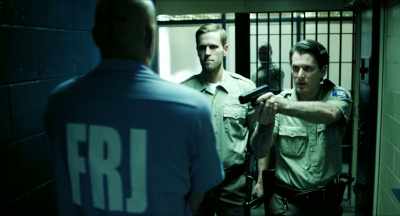 Take this redneck down
to the lower level for holding. - Brawl in Cell Block 99
