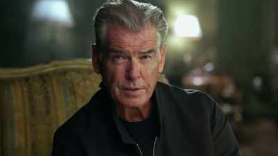 Terrified,
he runs into the street - History's Greatest Heists with Pierce Brosnan