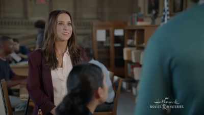 Tess Harper.
I work at the Sentinel. - Crossword Mysteries: Proposing Murder
