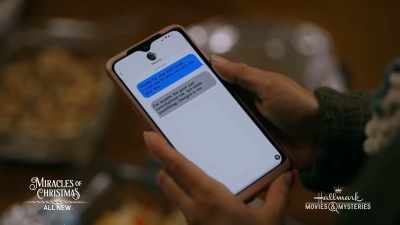 [text message chimes] - The Christmas Promise