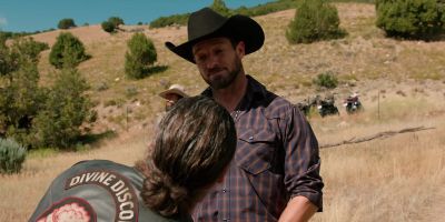 That badge says "Livestock Agent". - Yellowstone