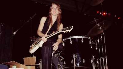 That bass player was Dana Strum, - Randy Rhoads: Reflections of a Guitar Icon