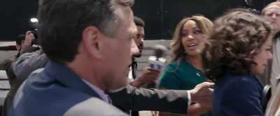 That was Jennifer Walters rushing by,
undoubtedly hoping to avoid the protesters - She-Hulk: Attorney at Law