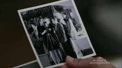 THAT LOOKS LIKE IT WAS TAKEN - Garage Sale Mysteries: Picture a Murder