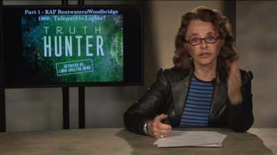 That night, while airman Lori
Buoen and John Trementozzi - Truth Hunter