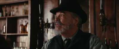 That oughtta liven up
this drab establishment considerably. - The Dead Don't Hurt